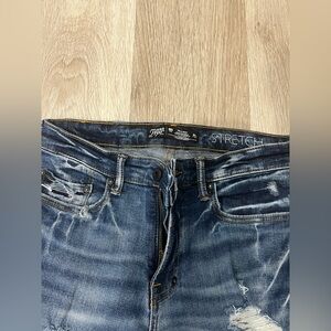 Distressed Blue Skinny Jeans